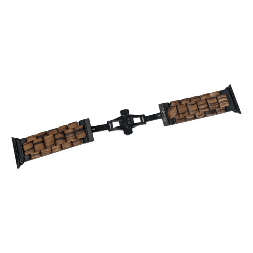 Introducing the Alpha Maui Band in Zebrawood 42mm (42-49mm), a smartwatch band that beautifully combines black metal and brown wooden links. Laid flat, it showcases its unique blend of materials and a central clasp mechanism. This accessory perfectly complements your Alpha Maui beach apparel, merging style with a touch of island flair.