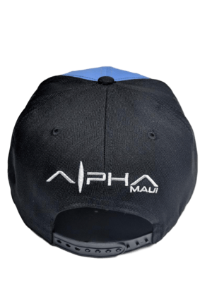 Rear view of "The Haleakala - Keiki Cap," a black kid-sized baseball cap with an adjustable strap. The cap features the logo "Alpha" in large white letters followed by a smaller text "Maui" on its back, radiating the spirit of Aloha.