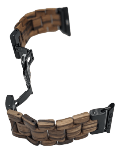 The Alpha Maui Band - Zebrawood 42mm (42-49mm) is showcased against a white background. This wooden watch band features intricately woven zebrawood links, exuding natural elegance reminiscent of Hawaii's serene beauty. The partially open black metal clasp reveals its sophisticated mechanism.