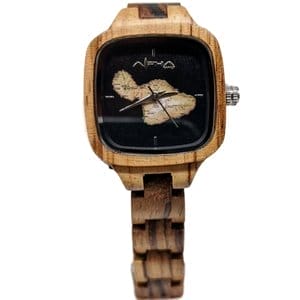 Introducing The Wahine: a wooden wristwatch featuring a square face and black dial decorated with an illustration of the Hawaiian Islands. It has white hour, minute, and second hands. Perfect for complementing your beach apparel, The Wahine features a wooden band showcasing various shades of wood grain.