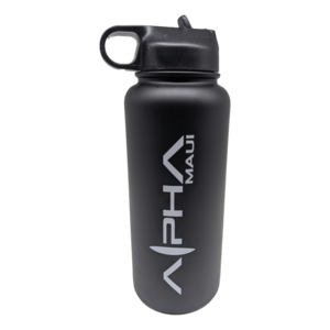 The Alpha Thermo is a black reusable water bottle featuring a screw-on lid, loop cap, and spout. Branded with "Alpha Maui" in white letters, this bottle perfectly complements your beach apparel and embodies the spirit of Hawaii.