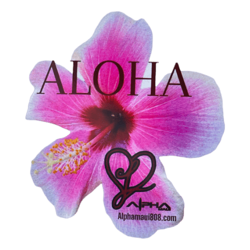 A pink hibiscus flower with the word "Aloha" written in bold letters above it. Below, there's a stylized heart shape with the text "Alpha" inside it, followed by "alphamaui.com" at the bottom. The design captures the essence of beach apparel, embodying the spirit of Aloha and Ohana perfectly for those who wear "Let The Universe...Do It's Thing".