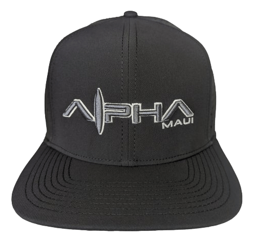 The Alpha Maui Waimana II is a black baseball cap featuring "Alpha" and "Maui" embroidered in white on the front, with the letter "A" in "Alpha" stylized to resemble a surfboard. Perfect for your Hawaii adventures, this cap includes a flat brim and stitched ventilation holes on top, embodying the spirit of Aloha.