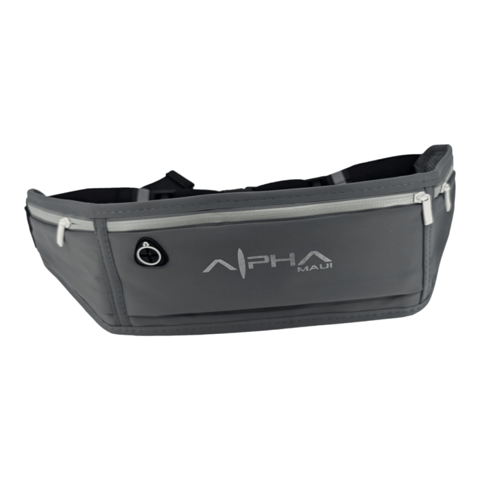 Introducing the Alpha Waist Pack: a gray waist pack with white zippers, proudly displaying the "Alpha Maui" logo and text on the front. This pack captures the spirit of Aloha with its multiple compartments and a black adjustable strap, making it ideal for keeping your essentials organized on any adventure.