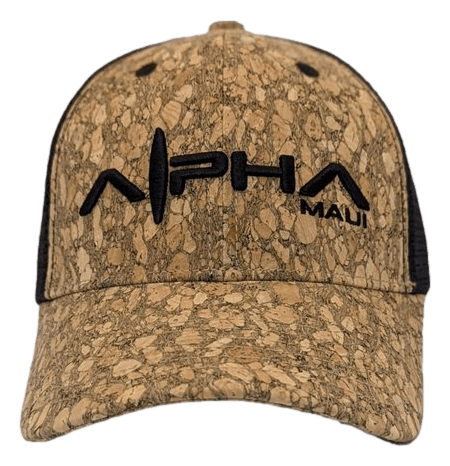 The Alpha Maui The Truckstah hat combines a cork-like texture on the front with black mesh material on the back and sides, making it an ideal choice for beachwear. The front displays "Alpha" in bold black capital letters with a stylized "A," accompanied by "Maui" in smaller black text on the right side, adding a hint of Hawaiian Aloha to your outfit.