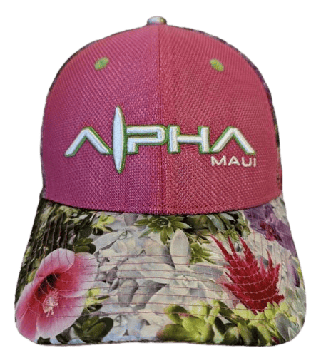 The Alpha Maui Garden Bouquet II is a pink baseball cap that boasts a floral pattern on the brim, with "Alpha Maui" displayed prominently in large white letters with green accents, and "Aloha" in smaller green letters. The brim's design features leaves and flower illustrations, capturing the true spirit of Ohana.