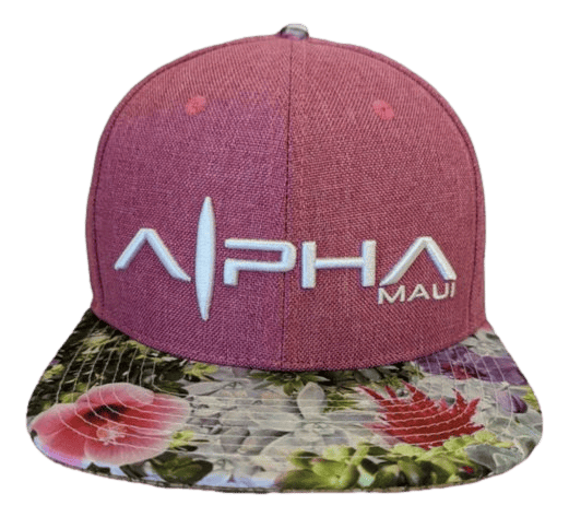 Introducing the Alpha Maui Garden Bouquet: a vibrant red baseball cap featuring "Alpha Maui" elegantly embroidered in white on the front. Just below, "Maui" is stitched in matching white thread. The brim is adorned with a lively floral pattern showcasing an array of pink, red, and green hues.