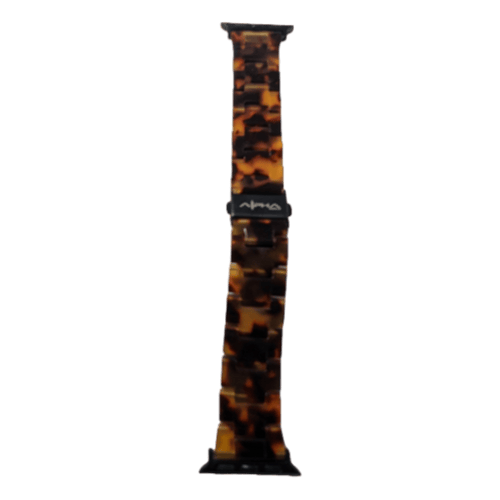 The Alpha Maui Band - Zebrawood 42mm (42-49mm) features a striking mosaic pattern in shades of brown, orange, and black that captures the essence of Hawaii. It is equipped with a clasp mechanism for secure fastening and includes a black logo tag with "Ohana" attached to the band.