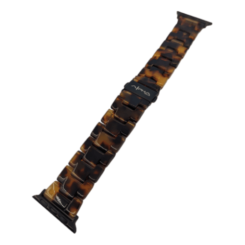 A wristwatch strap made of brown and black zebrawood with a silver buckle in the center. The Alpha Maui Band - Zebrawood 42mm (42-49mm) features a glossy finish and a sophisticated link design, making it an ideal accessory to enhance your chic Hawaii vibe with Alpha Maui beach apparel.