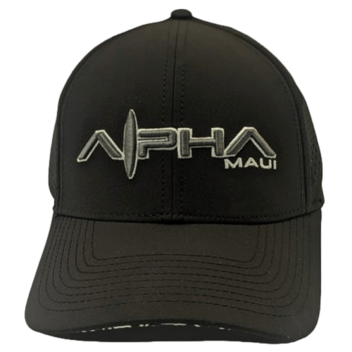 This black baseball cap, named Waimana, features "Alpha Maui" embroidered in white on the front. Perfect for beachwear, it showcases a stylized pattern with a vertical line integrated into the "A" of "Alpha". The cap includes a curved brim and mesh back panels, exuding Aloha spirit from Hawaii.