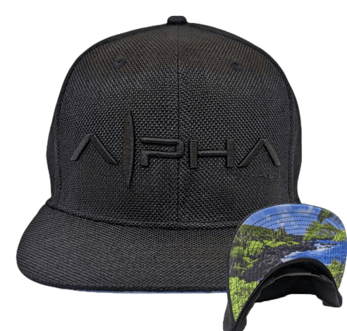 Introducing The Popolo: a black snapback hat with "Alpha" elegantly embroidered on the front. The underside of the brim showcases a vibrant nature scene, featuring a rocky shoreline and lush greenery set against a picturesque blue sky, making it an ideal addition to your beach apparel collection.