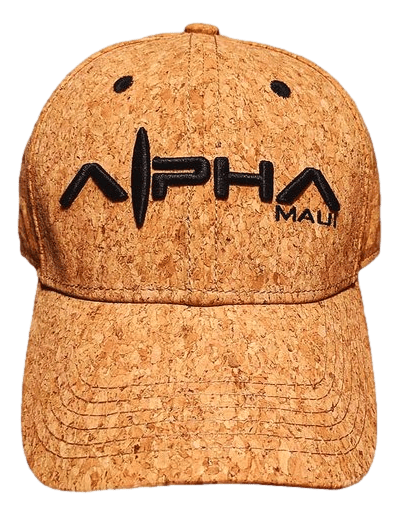 The "Cool Vibes" cork-textured baseball cap showcases the word "Alpha" with a stylized line through the letter "A" and "Maui" on the front. Ideal for beach apparel, it features ventilation eyelets on top and noticeable stitching on the brim, embodying the relaxed yet adventurous essence of Hawaii.