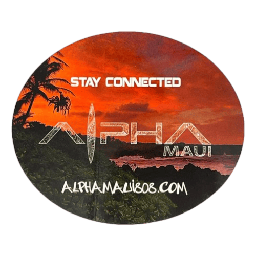 A circular sticker titled "Let The Universe...Do It's Thing," featuring a scenic sunset over an ocean shoreline with palm trees. The text "STAY CONNECTED" is at the top, and "Alpha Maui Ohana" is in the center. The website "alphamaui.com" is at the bottom, capturing the spirit of Aloha.