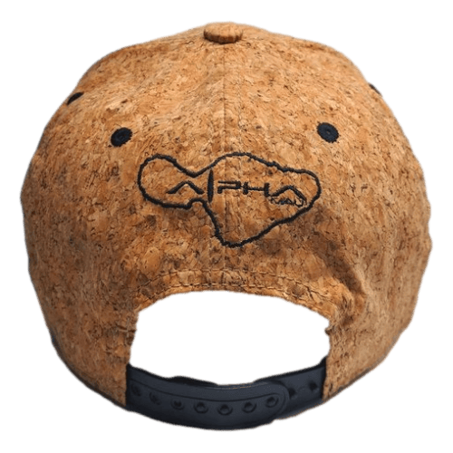The Good Vibes cap is a brown, cork-textured hat featuring an adjustable black plastic strap at the back. Perfect for beachwear, this cap showcases a logo embroidered in black, depicting an outline of a brain with the word "Alpha" inside it.