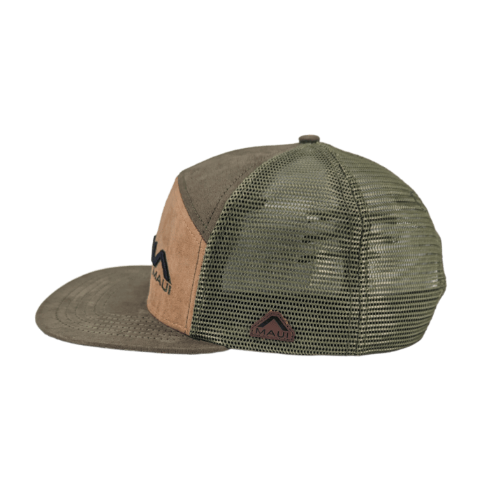 A side view of the Alpha Maui Kahmani trucker hat, featuring a green and tan color scheme with "Alpha Maui" embroidered on the front panel. The hat has a mesh back for ventilation, a solid front, and a flat brim.