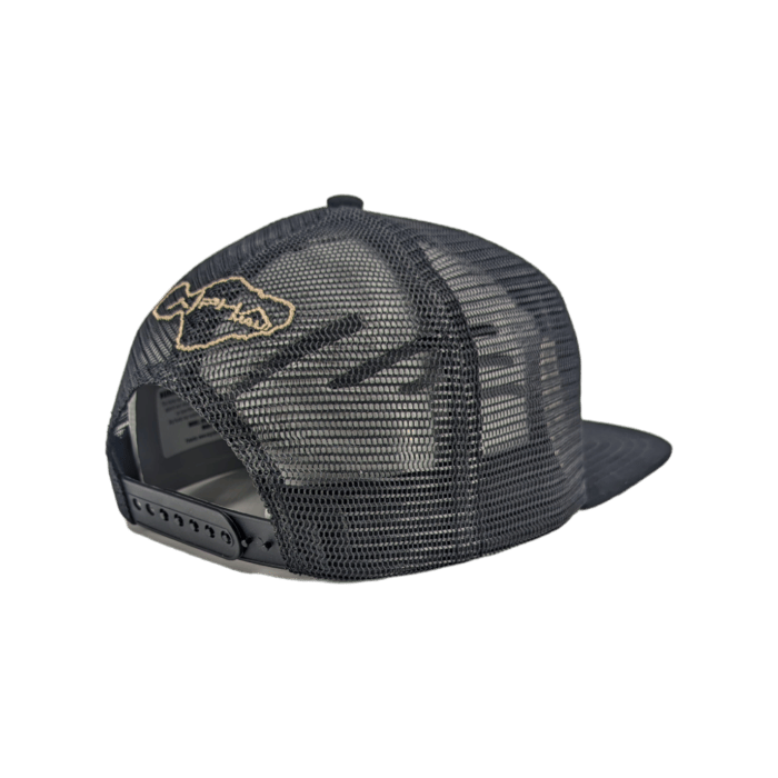 The Alpha Maui Kahmani is a black mesh trucker hat with an embroidered fish design in tan thread, shown from the back. It features an adjustable snapback closure and a curved brim, making it perfect for your next trip to Hawaii with your Ohana.