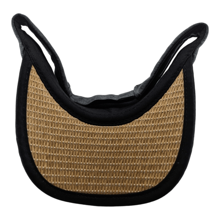 The Alpha Maui Mauka is a black horse saddle pad featuring a central woven, tan-colored rattan or straw-like material, bordered by soft black fabric. Its raised, curved edges provide cushioning and support. Reminiscent of beach apparel in Hawaii, this pad's distinct shape beautifully stands out against any transparent background.