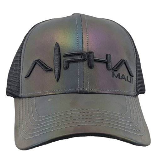 A shiny, iridescent trucker hat with a black mesh back and "Alpha Maui" embroidered in black on the front captures the Aloha spirit of Hawaii. The word "Alpha" features a decorative vertical line through the center of the 'A'. White stitching accents the brim, reminiscent of the Alpha Maui U'i Tank.