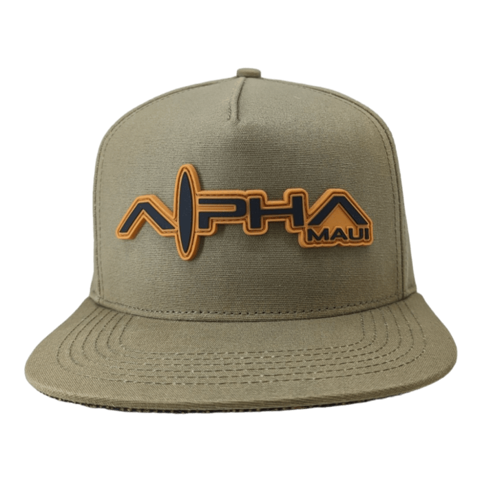 The Alpha Maui Coalition Forces snapback hat comes in khaki green with a 3D embroidered "Alpha Maui" logo on the front, featuring stylized orange and black lettering. This flat brim hat with visible stitching details is perfect for beach apparel, capturing that Hawaii Aloha spirit.