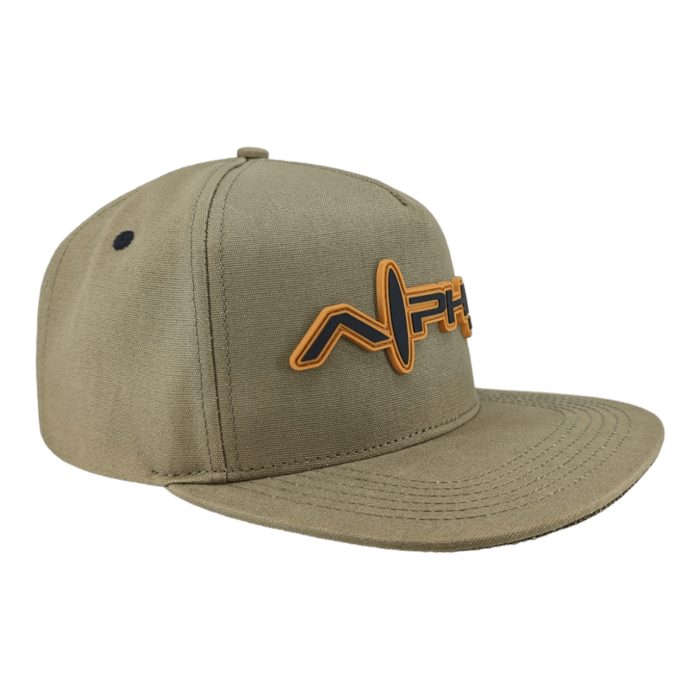 The Alpha Maui Coalition Forces baseball cap features a brown base with an orange and black embroidered logo on the front. The logo showcases stylized text with an integrated wave design, capturing the essence of Alpha Maui's aesthetic. It sports a flat brim and includes a black eyelet on the side panel, all set against a plain white background.