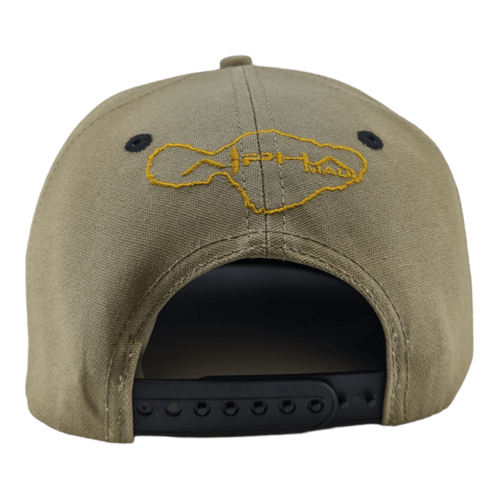 The Alpha Maui Coalition Forces baseball cap features a khaki color and a black plastic snap closure. The back showcases yellow embroidered stitching of an abstract design, resembling either a landscape or a logo, in the center above the opening. It's perfect for your Hawaii beach apparel collection.