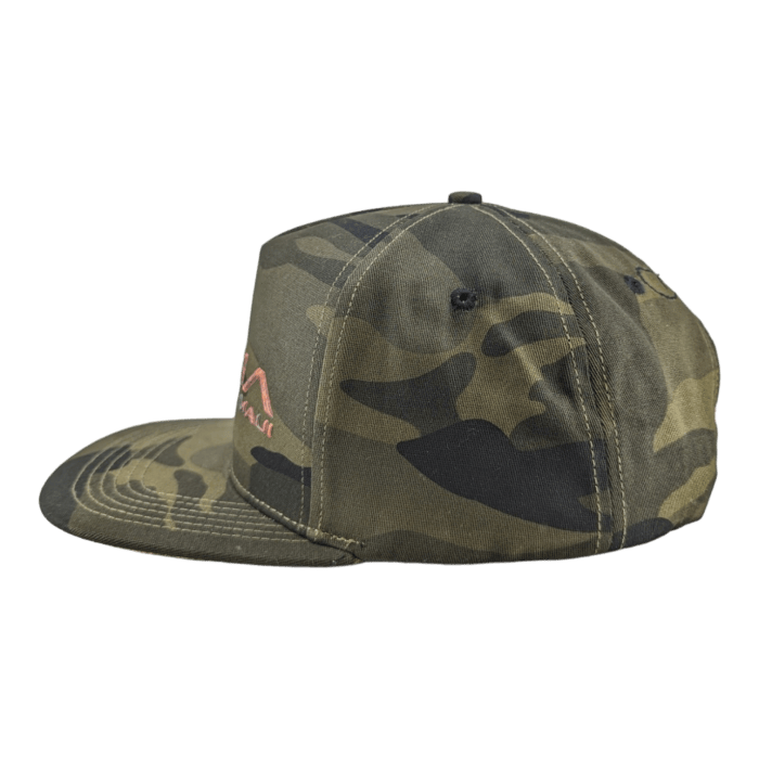 The Alpha Maui Coalition Forces baseball cap is designed with a camouflage pattern featuring shades of green and brown, complemented by a flat brim. It boasts a distinctive pink "Ohana" logo on the side panel and has a solid black background, making it perfect for adding a touch of Hawaii to your style.