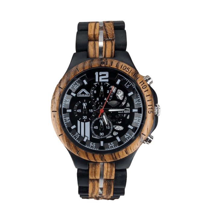 A wristwatch with a round, wooden bezel and a black dial featuring multiple subdials and white numerals. The watch, part of Alpha Maui's exclusive beach apparel line, has black and wooden-patterned links in its band, with a silver clasp. Time is displayed with white hands and a red seconds hand.