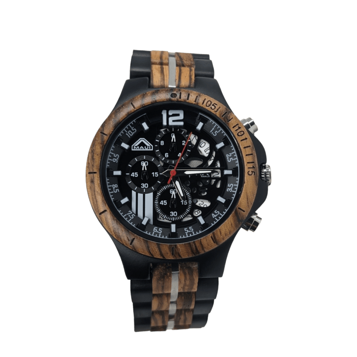 A wristwatch featuring a black dial with multiple subdials and a combination of black and wood-finish bezels and strap accents. With white hour markers, hands, and a prominent number "12" at the top, this watch embodies a sporty yet sophisticated design that complements any beach apparel for your Aloha adventures.