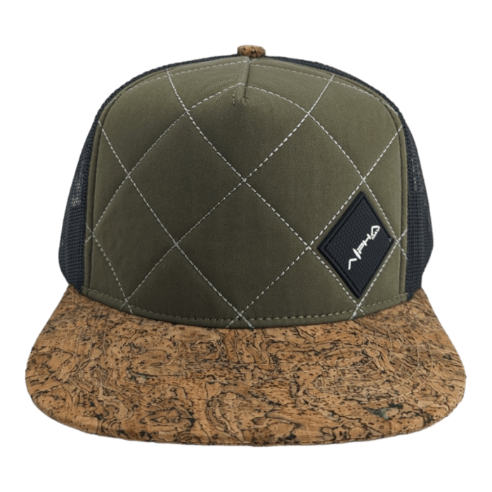 A green baseball cap with a geometric diamond pattern on the front panel, featuring a small black patch with white text on the left side. Ideal for beach apparel, the bill has a cork texture design, and the sides and back are made of black mesh material.