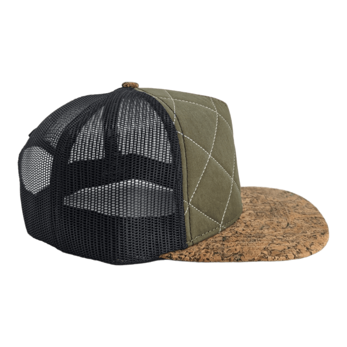 A unique cap featuring a quilted green fabric front, a black mesh back, and a broad cork-patterned brim. The green section has white stitch lines forming diamond patterns, adding a stylish touch perfect for an Aloha vibe.