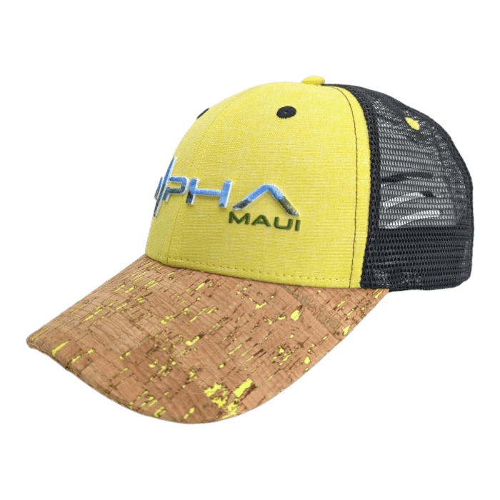 A stylish baseball cap with a cork brim, yellow front, and black mesh back. The front features embroidered blue and white text reading "PHA Maui." This cap combines various textures and colors for a distinctive design that brings the spirit of Aloha from Hawaii to your wardrobe.