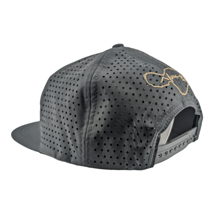 A black perforated baseball cap with an adjustable snapback, perfect for beach apparel. The cap features a large, yellow stylized signature logo on the side, exuding that Alpha Maui vibe. The numerous small holes ensure it remains breathable.