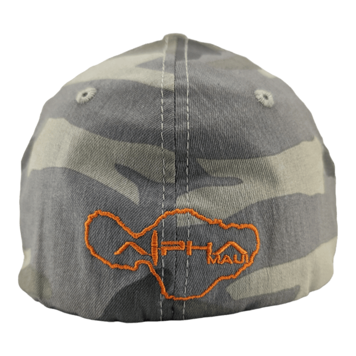 A camouflage-patterned baseball cap is shown from the back. The cap features an orange embroidered outline of Maui accompanied by the text "Alpha Maui," making it perfect for beach apparel enthusiasts.