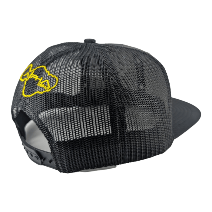 A black mesh baseball cap with a plastic snapback closure. The back features a yellow embroidered outline of a map with an irregular, zigzag pattern, making it a perfect piece of Alpha Maui beach apparel. The cap’s front panel is not visible in this image.