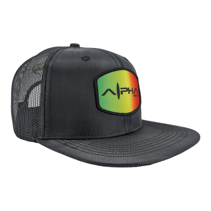 A stylish black mesh trucker cap with a curved bill. The front patch features the word "Alpha" in black letters against a gradient background of red, yellow, and green. Channeling the spirit of Aloha, the cap has a breathable mesh back and an adjustable snapback closure.