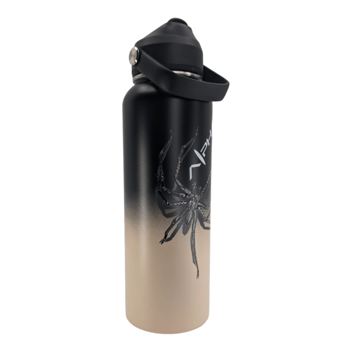 Introducing the Daddy Cane Thermo: a black-to-tan gradient water bottle equipped with a screw-on cap and a convenient carrying handle. Ideal for complementing your beach attire, this bottle is adorned with an intricate octopus design and the Alpha Maui logo in white text near the top, adding a hint of Hawaii's vibrant marine life to your daily adventures.