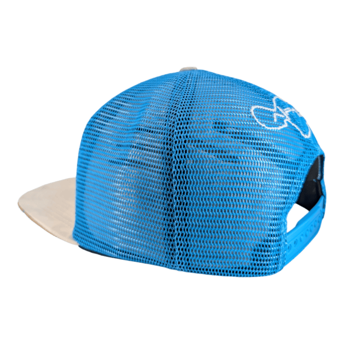 Rear view of The Chillee, a trucker hat featuring a blue mesh back, white front panel, and a white embroidered design on the side. It includes an adjustable snapback closure for customizable sizing. The hat is showcased against a solid black backdrop, accentuating its features.