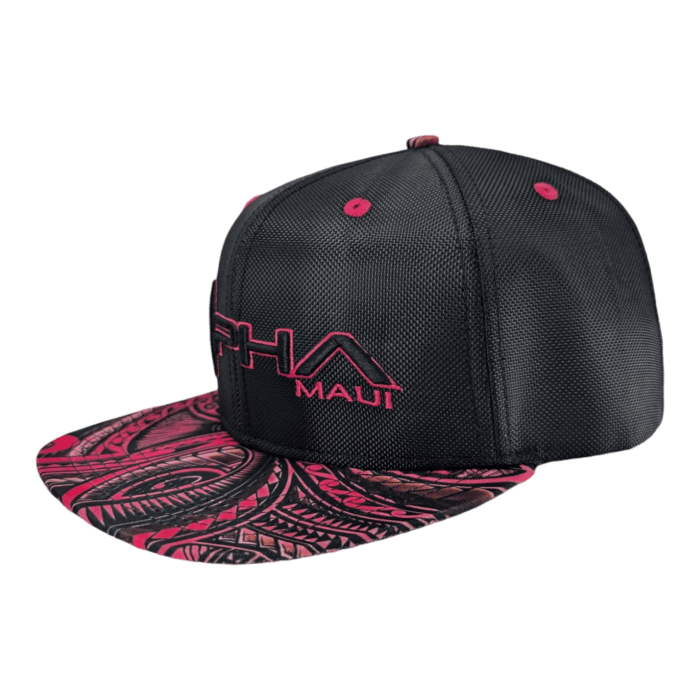 Introducing the Tribal Wai: a black snapback cap with striking pink accents. The front panel proudly displays "PHA MAUI" in vibrant pink, while the brim boasts an intricate design in both pink and black. This cap offers a modern, sporty aesthetic perfect for any occasion.