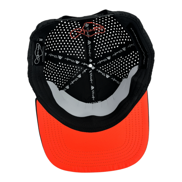 The underside of the Alpha Maui Lava Lite baseball cap features a dotted pattern and illustrations on the inner panels, with a prominently visible red brim.