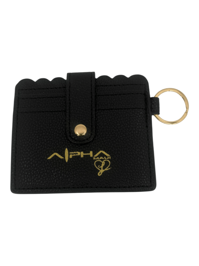A black cardholder with a gold keyring, gold button snap, scalloped edge, and gold "Alpha Kappa Alpha" text and logo on the front.