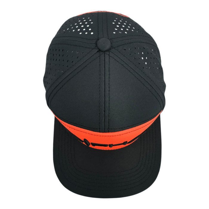 Top view of the Alpha Maui Lava Lite, a black baseball cap with perforated sections. It features an orange band encircling the crown, displaying a stylized design or text at the front.